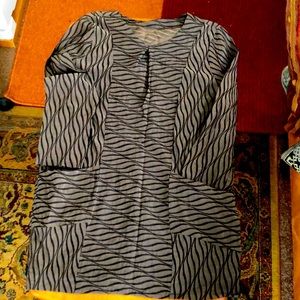 Stretchy slightly shiny bronze and black tunic top pockets cool pattern